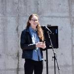 Photo by Haley Ausbun. Hannah Bahnmiller, the AmeriCorps Volunteers in Service to America (VISTA) community development specialist in the Sunset neighborhood for the past year, speaking at the dedication June 9 at Sunset Community Church.