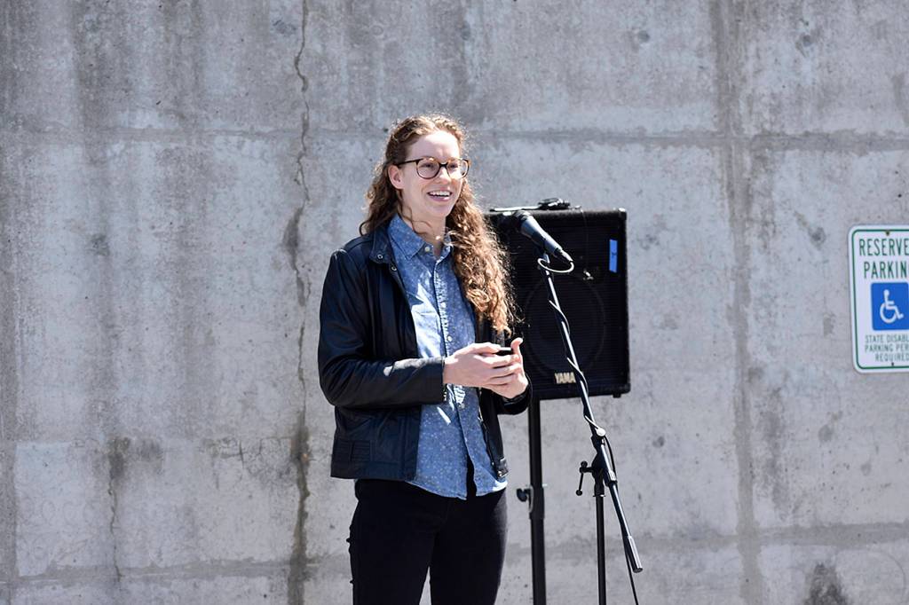 Photo by Haley Ausbun. Hannah Bahnmiller, the AmeriCorps Volunteers in Service to America (VISTA) community development specialist in the Sunset neighborhood for the past year, speaking at the dedication June 9 at Sunset Community Church.
