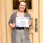 Elizabeth Selberg holding her award she received from the 17th Annual 5th Avenue Theatre Awards.                                Photo courtesy of Emma Austin.