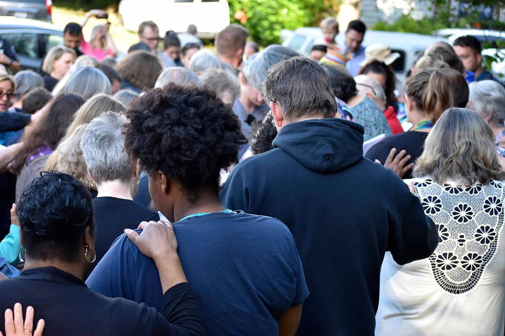 Photo by Haley Ausbun                                The United Christian Church in Renton held a prayer vigil Friday, June 21 in response to damage done to their pride display.