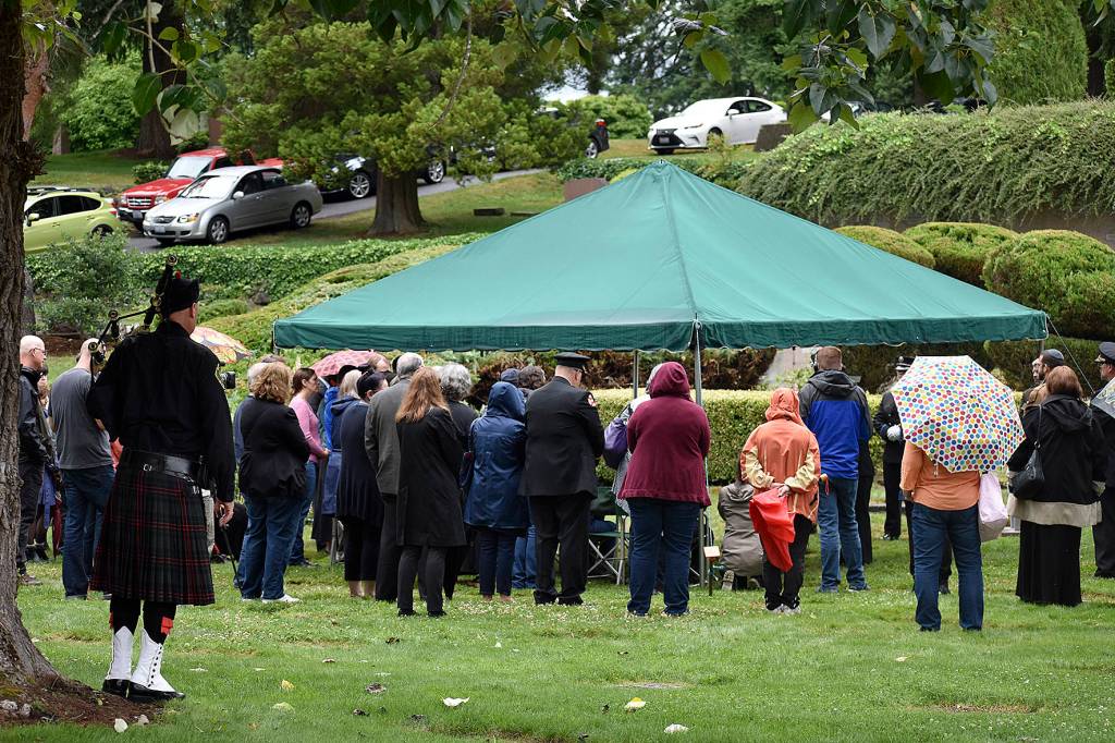 Photo by Haley Ausbun. Hundreds of people who passed away without family to bury them were remembered Wednesday, July 10, at the King County Medical Examiners Office Indigent Remains Ceremony at Mount Olivet Cemetery.