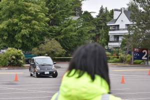 Photo by Haley Ausbun. President of the Seattle Electric Vehicle Association sped around in his car, named Mr. Bean, to show off an electric vehicles torque at Renton Technical College, July 30.