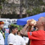 A traditional call kicks off a performance of Halau Hula Ka Lei Mokihana I Ka Ua Noe at the 10th annual Uwajimaya Renton Polynesian Festival, Saturday Aug. 17. Photo by Haley Ausbun.