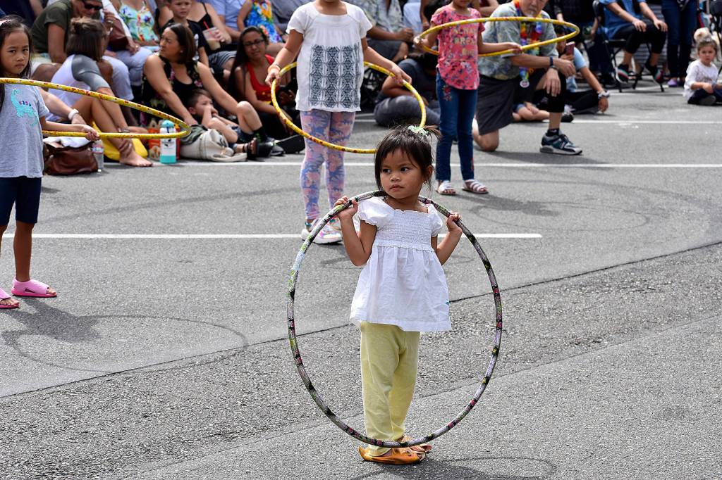Kids compete in the short but sweet Hula Hoop contest at the 10th annual Uwajimaya Renton Polynesian Festival, Saturday Aug. 17. Photo by Haley Ausbun.
