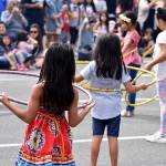 Kids compete in the short but sweet Hula Hoop contest at the 10th annual Uwajimaya Renton Polynesian Festival, Saturday Aug. 17. Photo by Haley Ausbun.