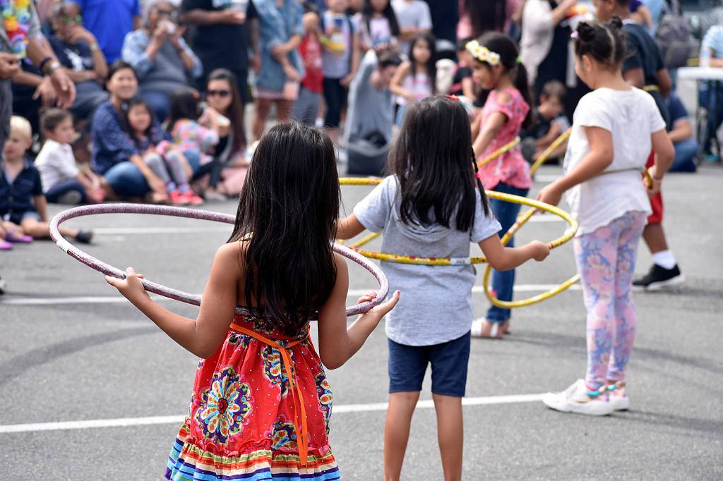 Kids compete in the short but sweet Hula Hoop contest at the 10th annual Uwajimaya Renton Polynesian Festival, Saturday Aug. 17. Photo by Haley Ausbun.
