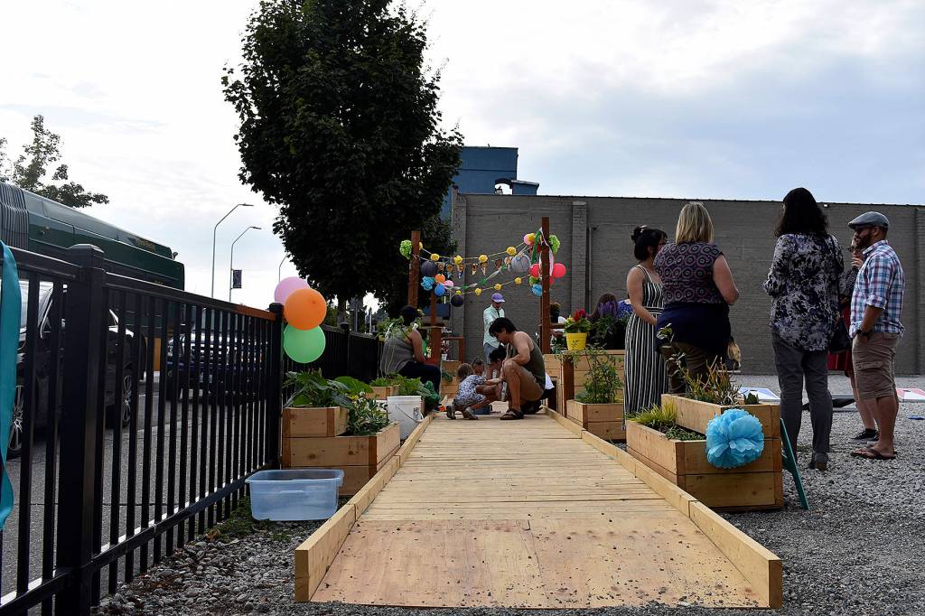 A new, temporary Pop-up Park gave Renton residents visiting the local farmers market a place to rest, or play, for a short-time.                                Photo by Haley Ausbun.