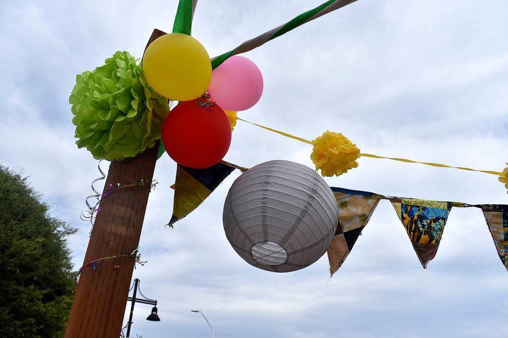 A new, temporary Pop-up Park gave Renton residents visiting the local farmers market a place to rest, or play, for a short-time.                                Photo by Haley Ausbun.