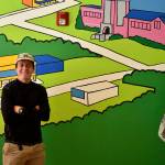 Photo by Haley Ausbun. Chip Coates, a Renton teacher, donated his time to install murals at the Valley Medical Center Childrens Therapy facility.