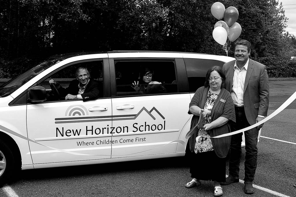 Photo by Haley Ausbun. Photo left to right: Tony Ventrella, Rachel Chronister, Marla Veliz, and Reagan Dunn at the Sept. 10 ribbon cutting for the New Horizon School van, gifted by King County Councilmember Reagan Dunn through the retired van program.