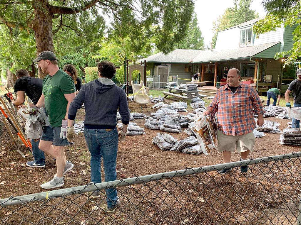 Volunteers help paint and fix up apartments and shelters provided to domestic violence victims by DAWN during King Countys Day of Caring on Sept. 13, 2019. Photo courtesy of DAWN.