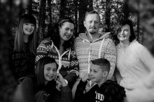 Photo courtesy of Ben Johnson. A photo of Christine and Ben Johnson, center, and their family.