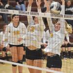 The Hazen team attempted to block at the net during an away game against Enumclaw on Thursday, Sept. 19. Photo by Kevin Hanson