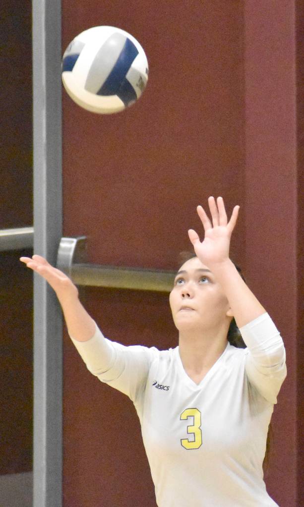 Angie Pham serves the ball during the Enumclaw vs. Hazen game on Thursday, Sept. 19. Photo by Kevin Hanson