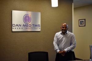 Photo by Haley Ausbun. Transcranial magnetic simulation (TMS) via Neurostar equipment is used to improve mental health, at a new Renton clinic from TMS national advocate Dr. Kalyan Dandala, pictured.