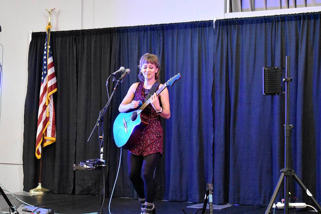 Photo by Haley Ausbun. The wine walk was back in downtown Renton, Friday, Sept. 27. The Renton Pavilion Events Center was outfitted with an artisan market and live music, including musician Emily McVicker.