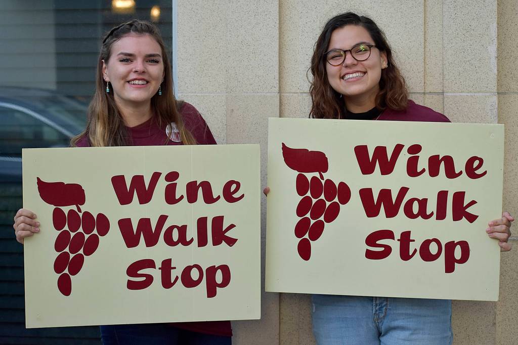 Photo by Haley Ausbun. The wine walk was back in downtown Renton, Friday, Sept. 27. Volunteers helped show attendees which businesses had wine-tasting sessions.