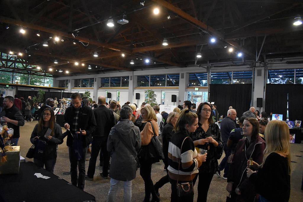 Photo by Haley Ausbun. The wine walk was back in downtown Renton, Friday, Sept. 27. The Renton Pavilion Events Center was outfitted with an artisan market and live music.