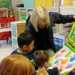 Photo courtesy of Shooting Star Preschool and Childcare. Sen. Patty Murray (D-WA) with tots in the Renton Highlands after being presented with a song and big welcome card.