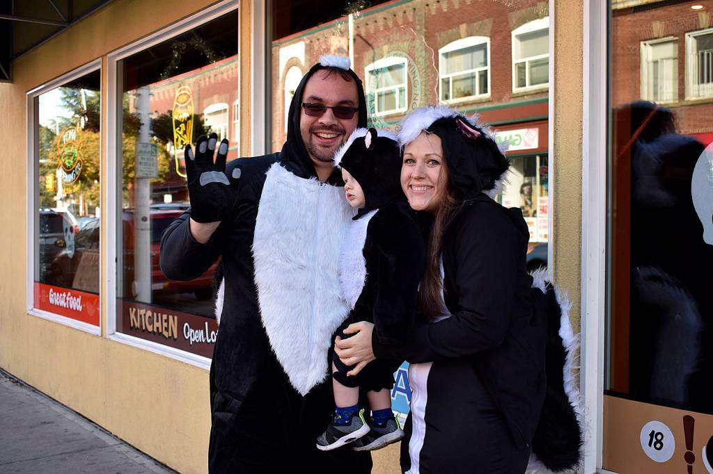 Photo by Haley Ausbun. Left to Right: Patrick, James and Jamie Watts skunk around the Olde Fashioned Halloween Party, Oct. 26.