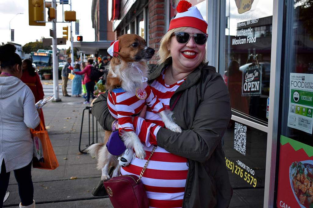 Photo by Haley Ausbun. Wheres Waldo times two as pup Marco and owner Yesenia wore matching costumes.