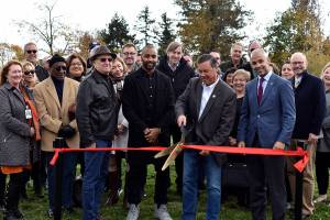 Photo by Haley Ausbun                                An honorary ribbon cutting at the site for the new Family First Community Center, Saturday, Oct. 26 next to Cascade Elementary School.