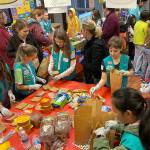 Photo by Haley Ausbun. Girl Scouts from troops 46754, 41126 and 41170 put together 400 sandwhich lunches on Saturday, Nov. 9 as part of Vision House kids serve event. The lunches then went to people experiencing homelessness in Seattle via Union Gospel Mission Search and Rescue.