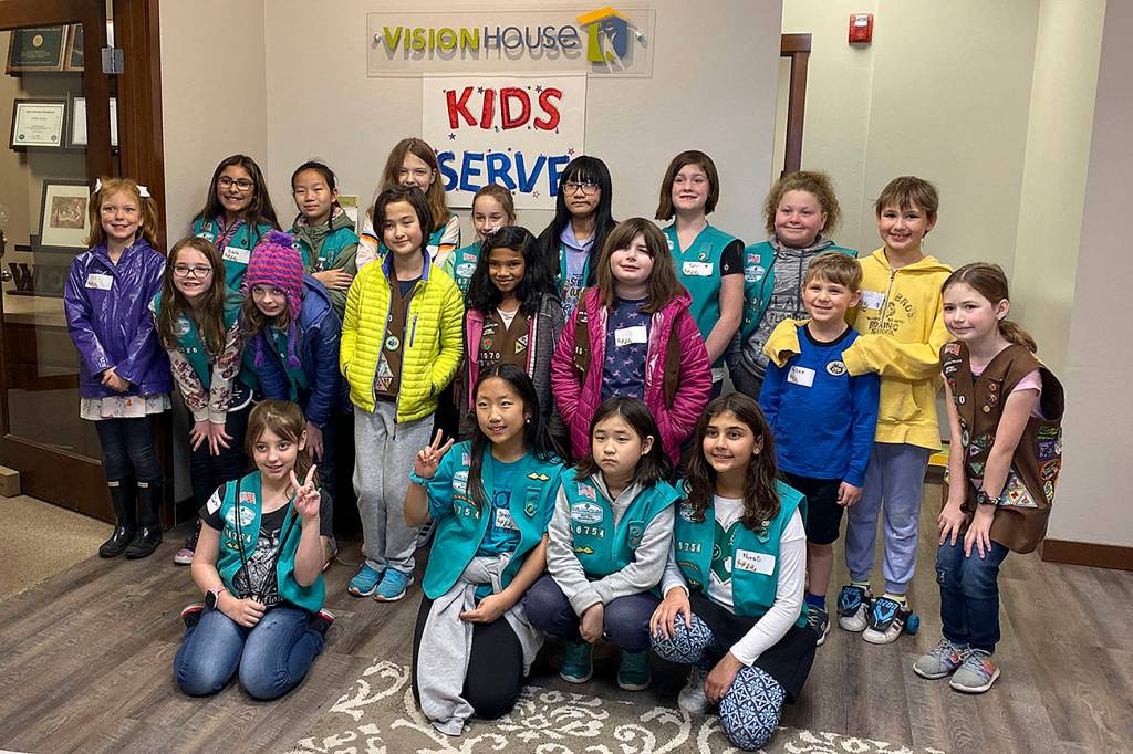 Photo by Haley Ausbun. Girl Scouts from troops 46754, 41126 and 41170 put together 400 sandwhich lunches on Saturday, Nov. 9 as part of Vision House kids serve event. The lunches then went to people experiencing homelessness in Seattle via Union Gospel Mission Search and Rescue.