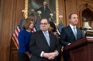 From left, Speaker of the House Nancy Pelosi, House Judiciary Committee Chairman Jerrold Nadler, D-N.Y., House Financial Services Committee Chairwoman Maxine Waters, D-Calif., House Foreign Affairs Committee Chairman Eliot Engel, D-N.Y., and House Intelligence Committee Chairman Adam Schiff, D-Calif., announce they are pushing ahead with two articles of impeachment against President Donald Trump  abuse of power and obstruction of Congress  charging he corrupted the U.S. election process and endangered national security in his dealings with Ukraine, at the Capitol in Washington on Tuesday. (AP Photo/J. Scott Applewhite)