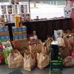 Photo courtesy of Handsome Devil Ink. The annual Bad Santa Food Drive brought in 842 pounds of food.