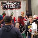Photo courtesy of Handsome Devil Ink. The annual Bad Santa Food Drive.
