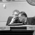 Photo courtesy of city of Renton. Future Mayor Armondo Pavone talks to Mayor Denis Law during his final council meeting, Monday, Dec. 9, 2019.