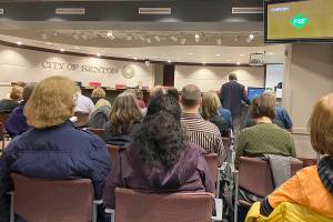Photo by Haley Ausbun. Opponent of the Energize Eastside project, Coalition of Eastside Neighborhoods for Sustainable Energy (CENSE) president Don Marsh presents to the Renton Hearing Examiner during a public hearing, Jan. 8, for the project.
