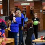 Photo by Haley Ausbun. In the Lindbergh High School library, United Way volunteers watched kids and small children while their parents talked to housing assistance providers at the Family Resource Exchange event on Martin Luther King Jr. Day, Jan. 20.