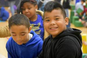 Photo by Haley Ausbun. Eli, a second grader, was working with the help of fellow students to complete an electrical circuit that was meant to turn on a light bulb. The students took several shots at the electrical engineering game, clearly sparking an interest in STEM.