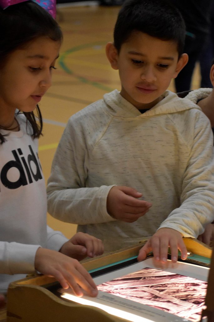 Photo by Haley Ausbun. Students at Highlands Elementary School saw STEM in a new, fun way with the Pacific Science Center Science on Wheels visit. During the visit, Amazon representatives announced a $2 million donation to two nonprofits.