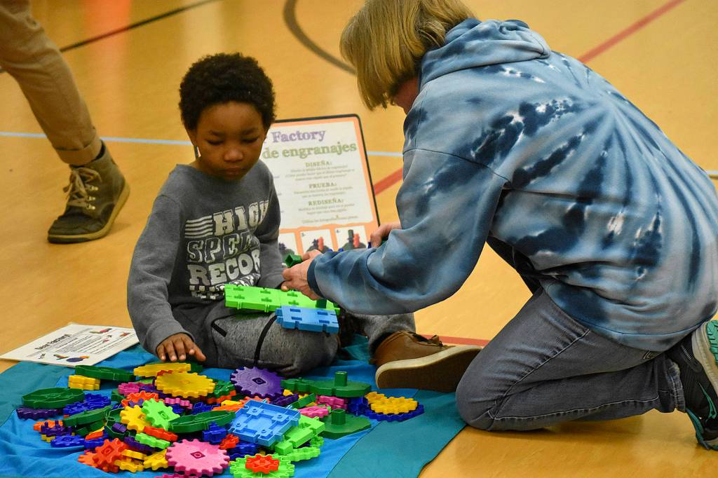 Photo by Haley Ausbun. Students at Highlands Elementary School saw STEM in a new, fun way with the Pacific Science Center Science on Wheels visit. During the visit, Amazon representatives announced a $2 million donation to two nonprofits.