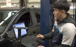 Courtesy of Renton Schools. Through a mentor program between local students and car dealerships, involving Renton School District Career Technical Education (CTE) worksite learning coordinators, nonprofit Mentor Washington and Communities in Schools Renton-Tukwila, students are getting both careers and a friendly hand on stepping into the adulthood. Pictured: First mentee in the program Nick Romo, who has gone on to continue his career after the program and is nearly a master technician, in a video about the program.