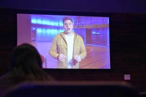 Photo by Haley Ausbun                                During halftime, athletes and coaches have individual meetings, while parents watch a video prepared by Highlands Community Church for whatever biblical principle teams are learning about that week at the Upward sports league.