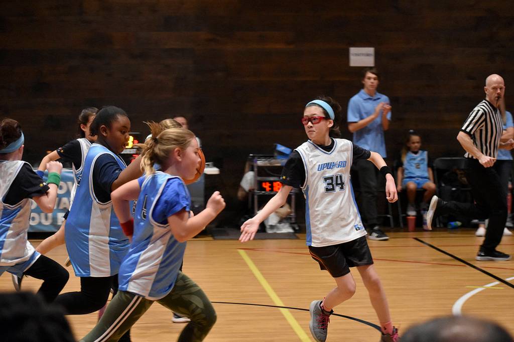 Photo by Haley Ausbun                                Students play positive, equitable games at Highlands Community Churchs branch of the Upward sports league, Saturday, Feb. 15 at the Family Life Center.