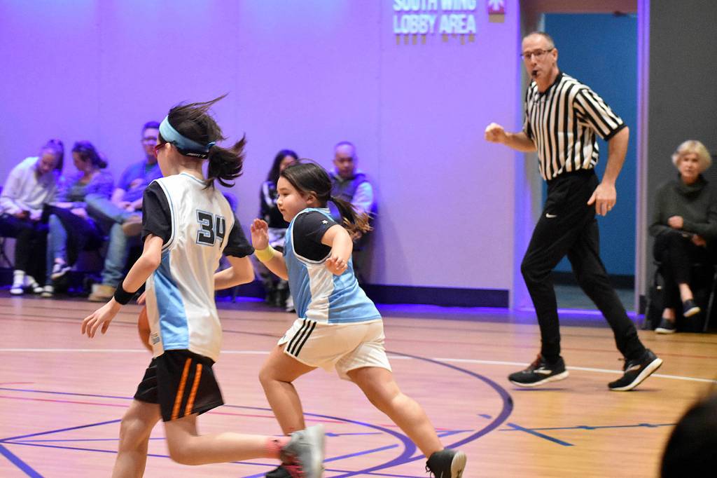 Photo by Haley Ausbun                                Students play positive, equitable games at Highlands Community Churchs branch of the Upward sports league, Saturday, Feb. 15 at the Family Life Center.