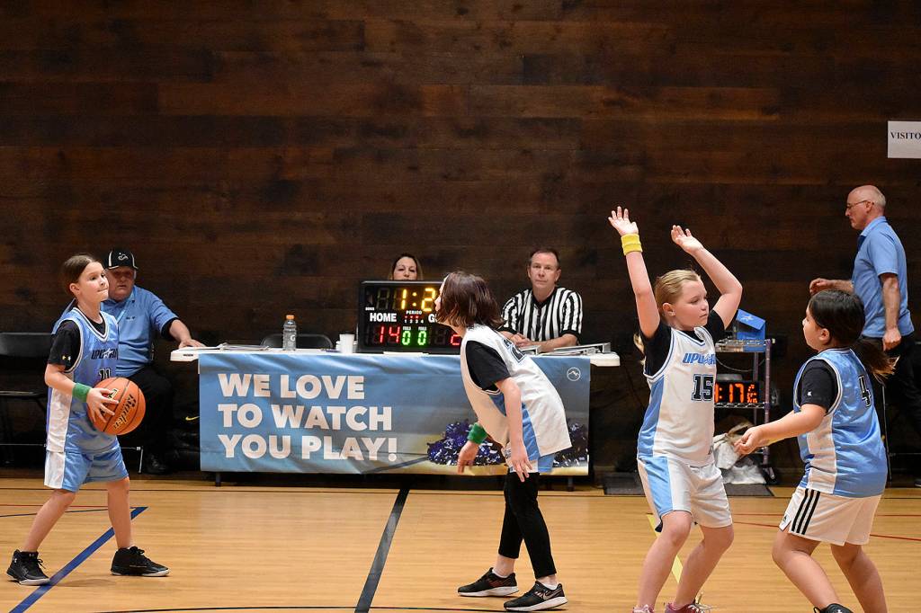 Photo by Haley Ausbun                                Students play positive, equitable games at Highlands Community Churchs branch of the Upward sports league, Saturday, Feb. 15 at the Family Life Center.