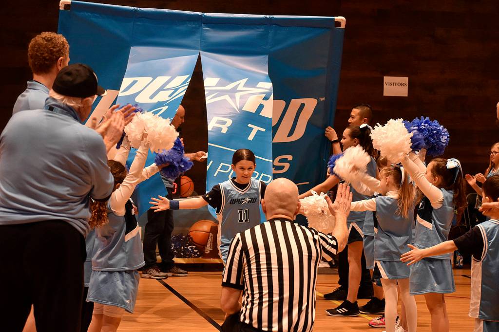 Photo by Haley Ausbun                                Students play positive, equitable games at Highlands Community Churchs branch of the Upward sports league, Saturday, Feb. 15 at the Family Life Center.