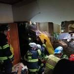 Puget Sound Fire District rescuers work to remove a tree that pinned a man in an apartment complex in unincorporated Maple Valley on Sunday, Feb. 23, 2020.                                 Photo courtesy of Puget Sound Fire.
