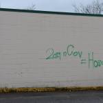 Photo by Haley Ausbun. While public health officials and leaders try to get information out to county residents, confusion and fear continue to spread. Pictured: graffiti in the Renton Sunset neighborhood that reads: 2019 nCov = HoaxKnow of more event cancellations and facility closures in the Renton area due to novel coronavirus? Let the reporter know at hausbun@rentonreporter.com.