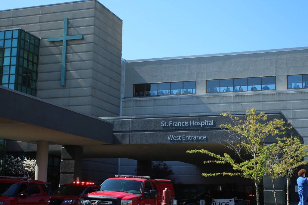 Dozen of staff members viewed the parade from the hospitals skybridge. Olivia Sullivan/staff photo