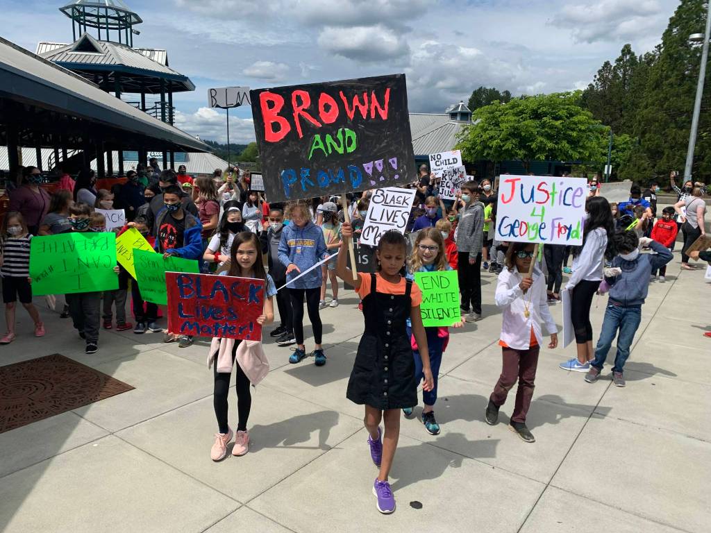 Kennydale Elementary 4th grader Tessi Grove (center) organized the protest. Photo by David Nelson.
