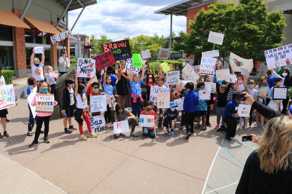 Students from Kennydale Elementary protested Black Lives Matter from Gene Coulon Park to the Landing. More than 40 students along with parents, siblings and staff also protested. Photo by David Nelson.