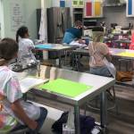 Kids find their stations for the first-ever cooking class at Young Chefs Academy Tuesday, June 23. The culinary arts school serves kids and teens in Covington and the surrounding areas. Courtesy photo/YCA Covington