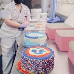 RTC student Rose Milianta with completed cakes for birthday dreams. Courtesy photo/Renton Technical College